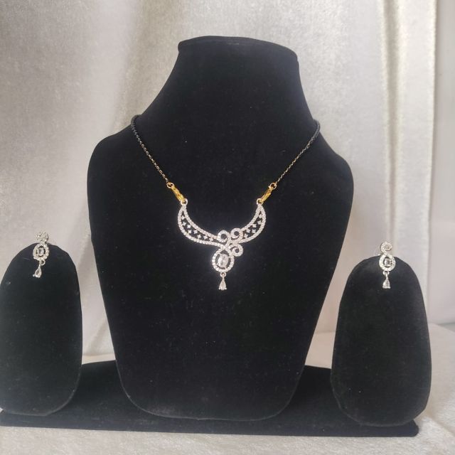 Elegant Swirl Design American Diamond Mangalsutra Set with Earrings